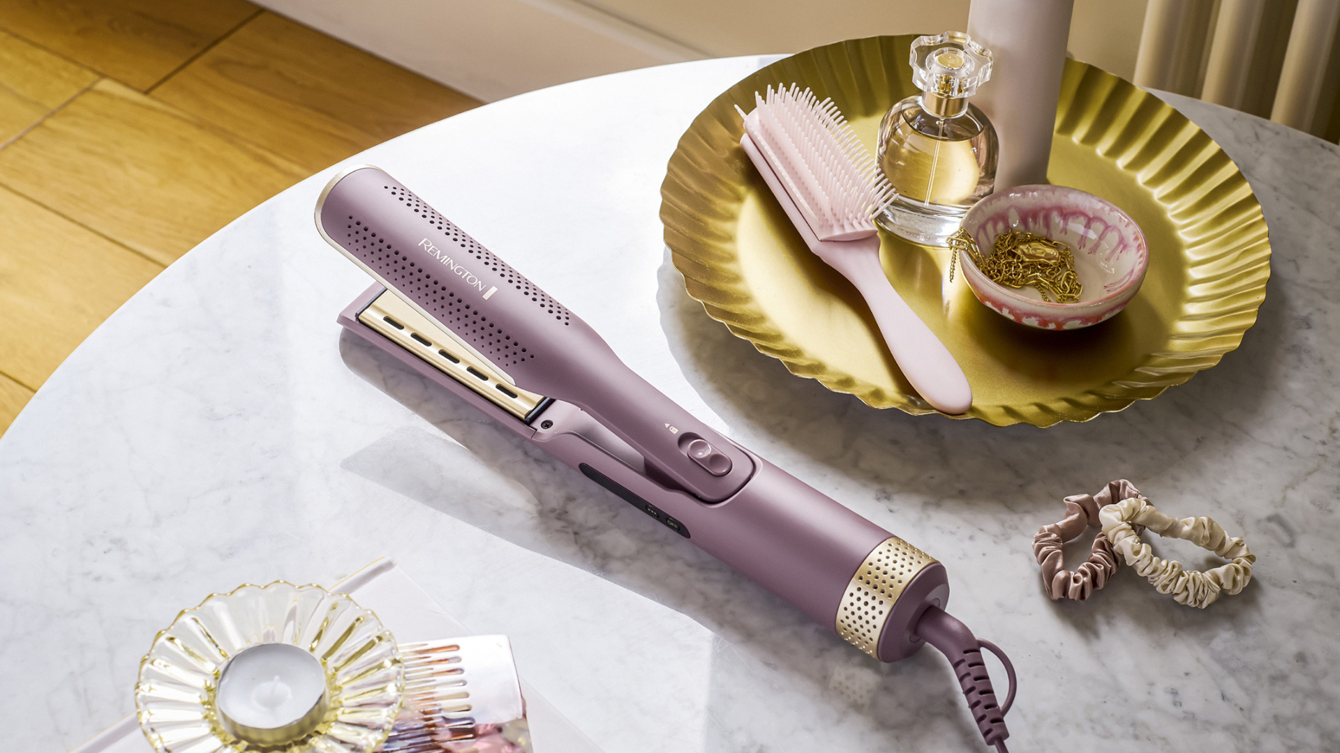 Der AIRvive 2-in-1 Airstyler in Violett und Gold von Remington